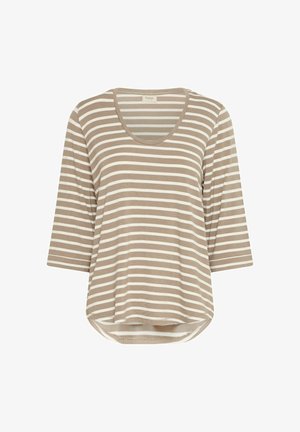 Dryžuota palaidinė su smėlio ir baltos spalvų deriniu, pagaminta iš švelnaus audinio, su apvalia iškirpte ir trijų ketvirčių rankovėmis, su apvaliu kraštu.