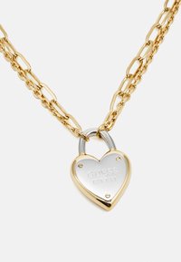 Guess ALL YOU NEED IS LOVE złoty