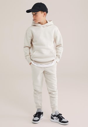 WE Fashion Träningsbyxor - beige