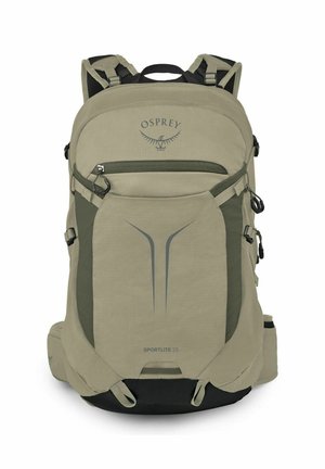 Sac à dos de randonnée Osprey Sportlite 25 marron clair avec poche zippée à l'avant, bretelles rembourrées et sangles de compression latérales.