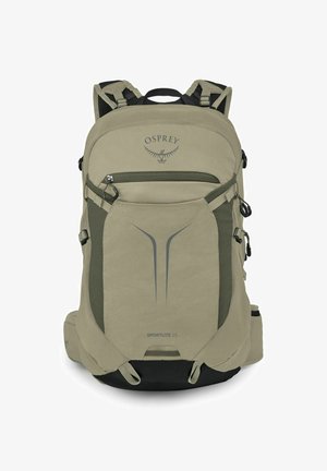 Sac à dos de randonnée Osprey Sportlite 25 marron clair avec poche zippée à l'avant, bretelles rembourrées et sangles de compression latérales.