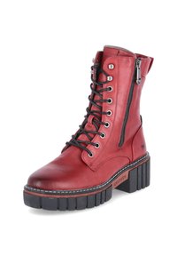 Red leather ankle boot with a round toe, black lace-up design, side zipper, and chunky rubber sole with ridged texture.