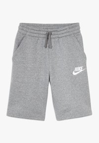 Grå bomullsshorts med elastiskt midjeband och snörning, med sidofickor och en vit Nike-logotyp på vänster ben.