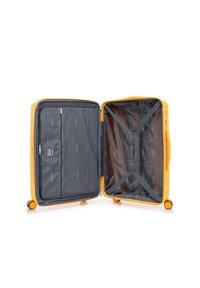 Valigia rigida gialla con tasca esterna con zip, interno grigio con fodera a motivo, cinghie incrociate e doppie ruote per la mobilità.
