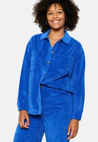 Unselected, electric blue