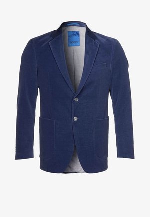 Marineblauer Herrenblazer mit Notch-Revers, zwei vorderen Knöpfen, aufgesetzten Taschen und einer Brusttasche, innen mit hellgrauem Stoff gefüttert.