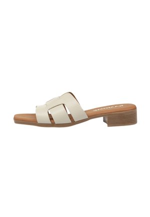 Sandalia de piel blanca tipo slide con tres tiras anchas, tacón bajo apilado y plantilla acolchada marrón.