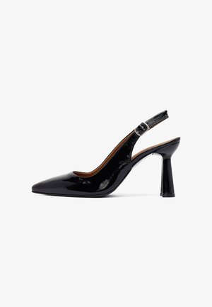 Black patent leather slingback heel with a pointed toe, a shiny finish, adjustable buckle strap, and a unique tapered block heel.