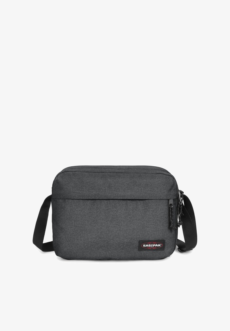 Borsa a tracolla in tessuto grigio con forma piatta e rettangolare, dotata di una singola tracolla regolabile e una tasca frontale con zip. Logo Eastpak visibile.