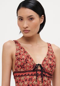 Rip Curl SOLEIL ONE PIECE - Maillot de bain - rust