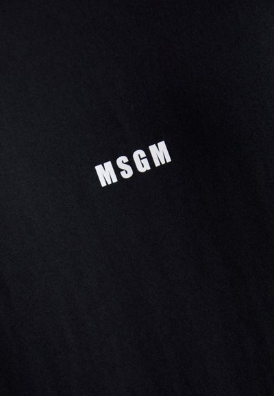 Schwarzes Baumwoll-T-Shirt mit einem weißen "MSGM"-Logo auf der Vorderseite. Weiche Textur mit klassischem Rundhalsausschnitt-Design.
