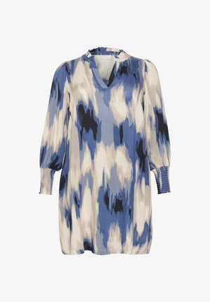 Blouse à motifs bleus et blancs avec un col en V et des détails froncés aux poignets. Présente un tissu fluide et une silhouette décontractée.