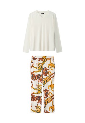 White long-sleeve V-neck top paired with white pants featuring an all-over colorful tiger print in orange, blue, and yellow tones.