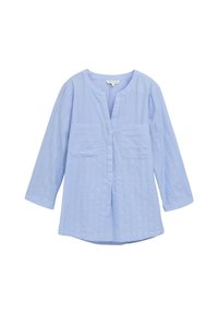Light blue cotton blouse with long sleeves, two front pockets, buttoned V-neckline, and a slightly curved hem. Textured ribbed detail throughout.