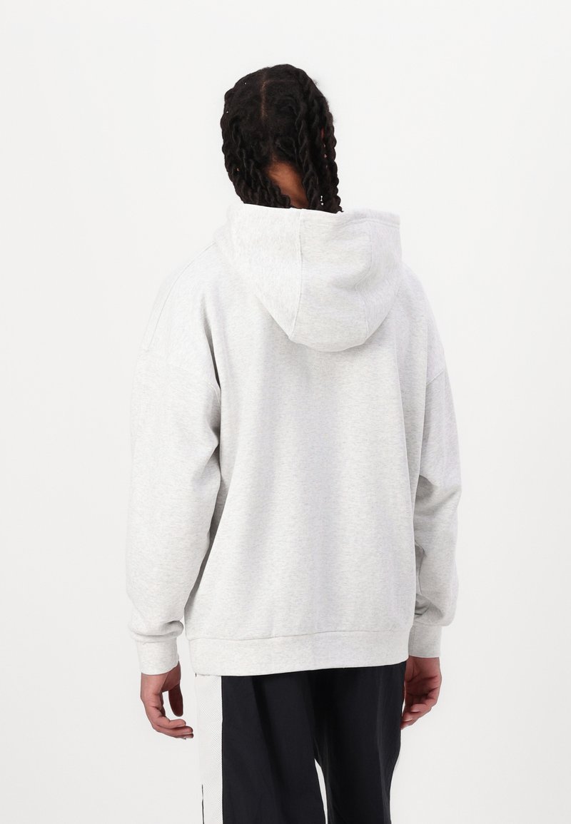 Grauer Kapuzenpullover mit Kordelzug, lockerer Passform, gerippten Bündchen und Saum, mit einer weichen Textur und schlichtem Design.