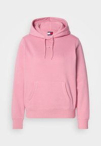 Sudadera rosa de tela suave, con un bolsillo frontal, capucha con cordón y texto del logotipo en blanco. Los puños y el dobladillo son acanalados.
