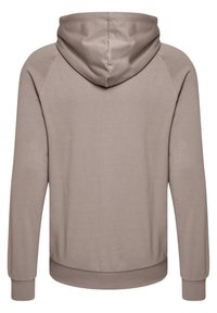 Ljust brunt hoodies med en jämn textur, långa ärmar och en enfärgad design. Har en känguruficka och ribbade muddar.