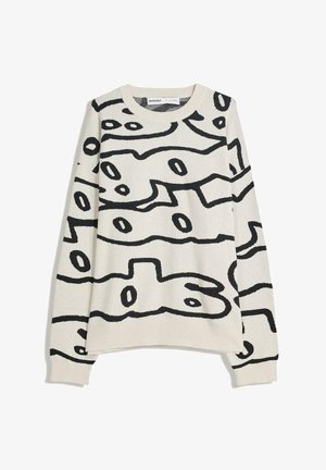 Krémový sveter s veľkým čiernym abstraktným vzorom. Má okrúhly výstrih, dlhé rukávy a žebrované manžety a spodný okraj. Mäkká pletená textúra.