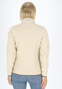 Beige fleecedonsjacket met een hoge kraag, voorzien van een bruine rand aan de zoom en manchetten, een gladde textuur en subtiele stikdetails.