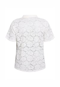 Chemisier blanc en dentelle à manches courtes avec un motif floral, col classique et texture douce. La vue de dos montre des détails en dentelle complexes.