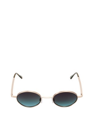 Lunettes de soleil ovales avec une fine monture en métal doré et des verres dégradés foncés, vues de face sur un fond blanc.