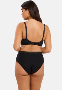 Black bra and high-waisted panties, both in soft fabric. Bra features adjustable straps and hook closure; panties have lace trim at the waist.