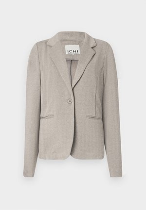 Hellgrauer Fischgrätenblazer mit einer einzelnen Knopfschließe, zwei vorderen Taschen und Reverskragen. Hergestellt aus strukturiertem Stoff.