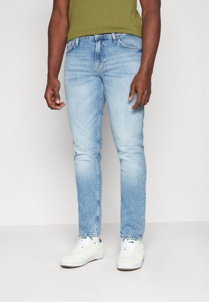 SLIM TAPERED - Vaqueros tapered - rooted