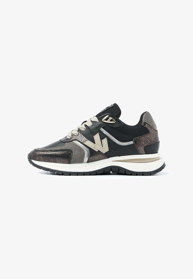 Black and gray sneaker with metallic accents, textured leather, mesh upper, beige laces, and a white midsole. Features a black rubber outsole.