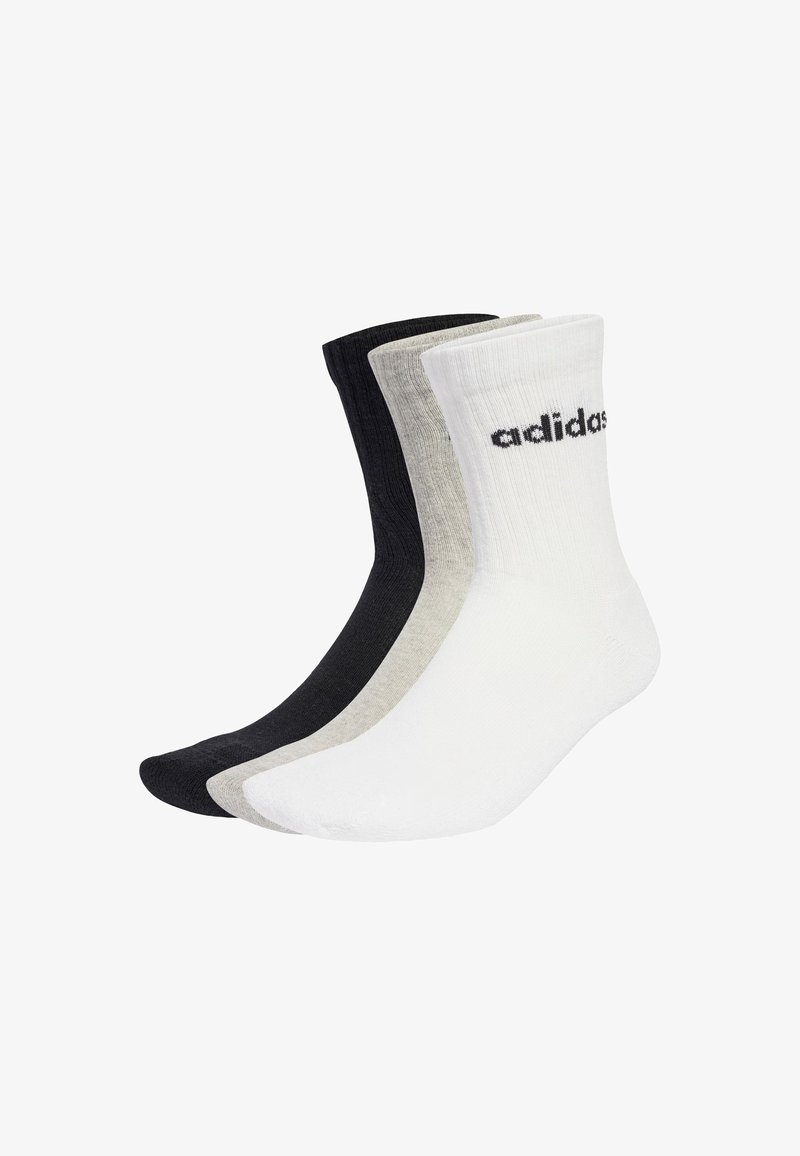 Tři páry ponožek s délkou po lýtko v černé, šedé a bílé barvě. Vyrobené z texturované látky, s žebrovaným vrškem a výrazným logem "adidas" na bílé ponožce.