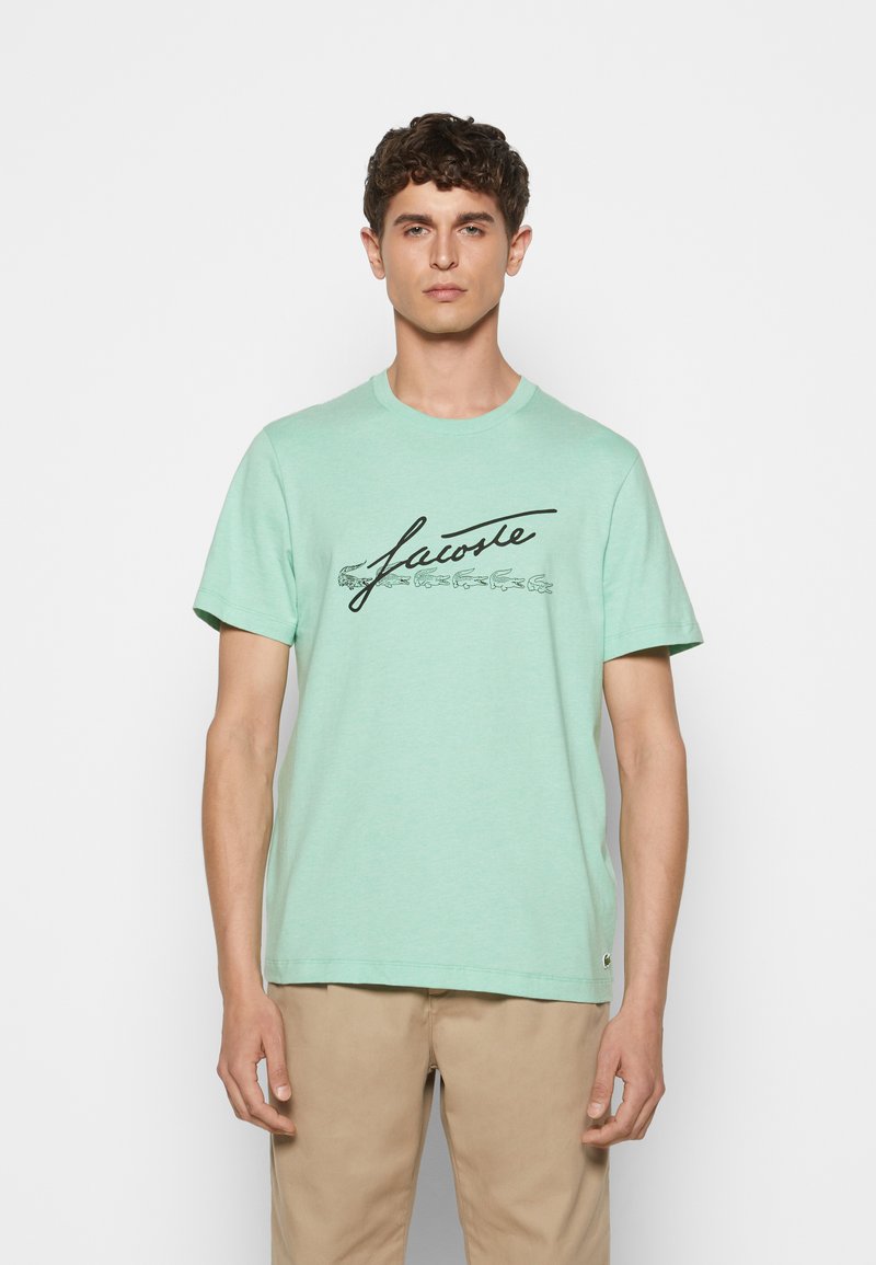 Herren T-Shirts basic | Lacoste T-Shirt print vert/hellgrün - SR04200 Herren T-Shirts basic | Lacoste T-Shirt print vert/hellgrün - SR04200