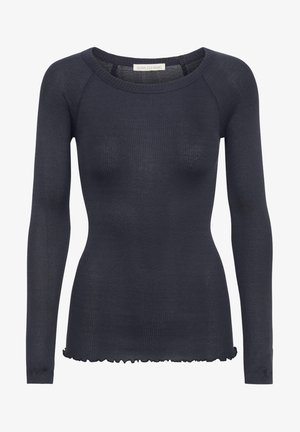 Tamno mornarica dug rukav pulover s rebrastim uzorkom i okruglim izrezom, s teksturiranim materijalom i volanima na donjem rubu.