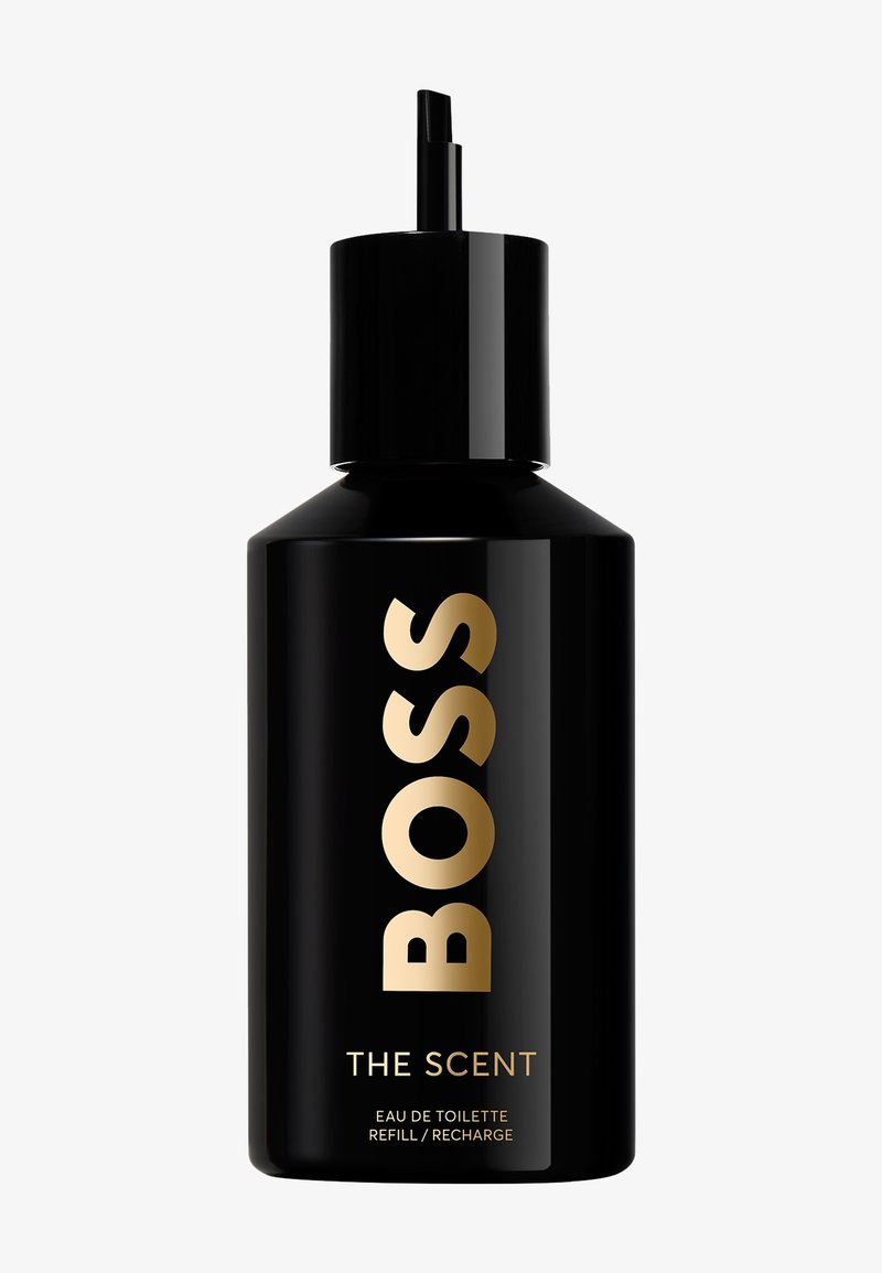 Schwarze Pumpflasche mit der Aufschrift "BOSS THE SCENT" in Goldtext, gestaltet als Nachfüllbehälter für Eau de Toilette.