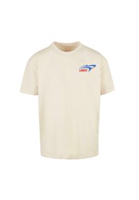 Lys beige bomulds t-shirt med rund hals, korte ærmer og et multikolor grafisk logo i blå og rød på venstre bryst.