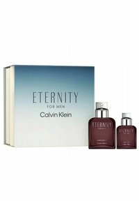 Calvin Klein Eternity for Men - tuoksusetti, joka sisältää kaksi tummaa meripihkaista lasipulloa hopeakapseleilla, esiteltyinä sinivalkoisessa sävytetyssä laatikossa.