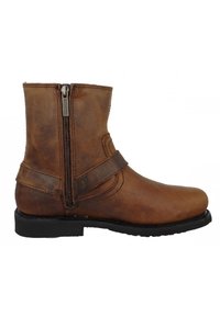 Bruine leren enkelboot met een zijrits, platte zwarte zool en een decoratieve band om de enkel. Gladde textuur, ronde neus.