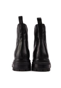 Black leather ankle boots with a chunky sole, pull tabs on the back, and seamless stitching. The design features a smooth finish.