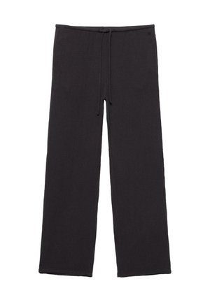Pantalon de survêtement noir à jambes larges avec taille élastique et cordon de serrage, devant lisse, sans poches visibles.