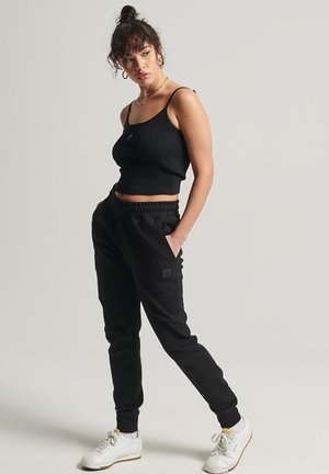 TECH - Trainingsbroek - black