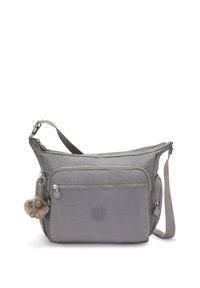 Grau Stoff Schultertasche mit einer Reißverschlussfronttasche, verstellbarem Gurt und einem flauschigen Charm-Schlüsselanhänger. Ikonisches Logo geprägt auf der Vorderseite.