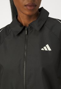 adidas Sportswear STADIUM COVER - Colete - black/off-white