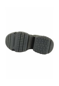 Black rubber shoe sole with a textured surface, featuring ridged and dotted patterns for traction, and a rounded heel for stability.