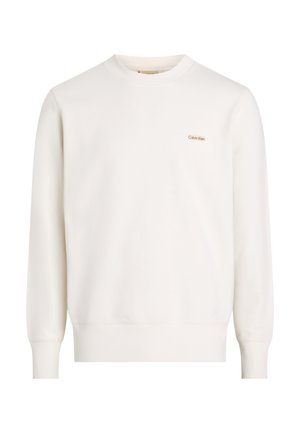 Witte sweatshirt van zacht materiaal, met een ronde hals en ribgebreide manchetten. Klein beige Calvin Klein-logo op de borst.