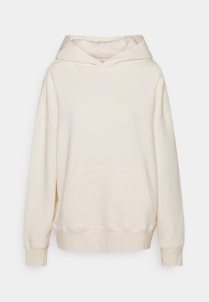 Sweat à capuche couleur crème avec une grande poche avant, des poignets côtelés et une capuche classique à cordon. Tissu doux avec une coupe décontractée.