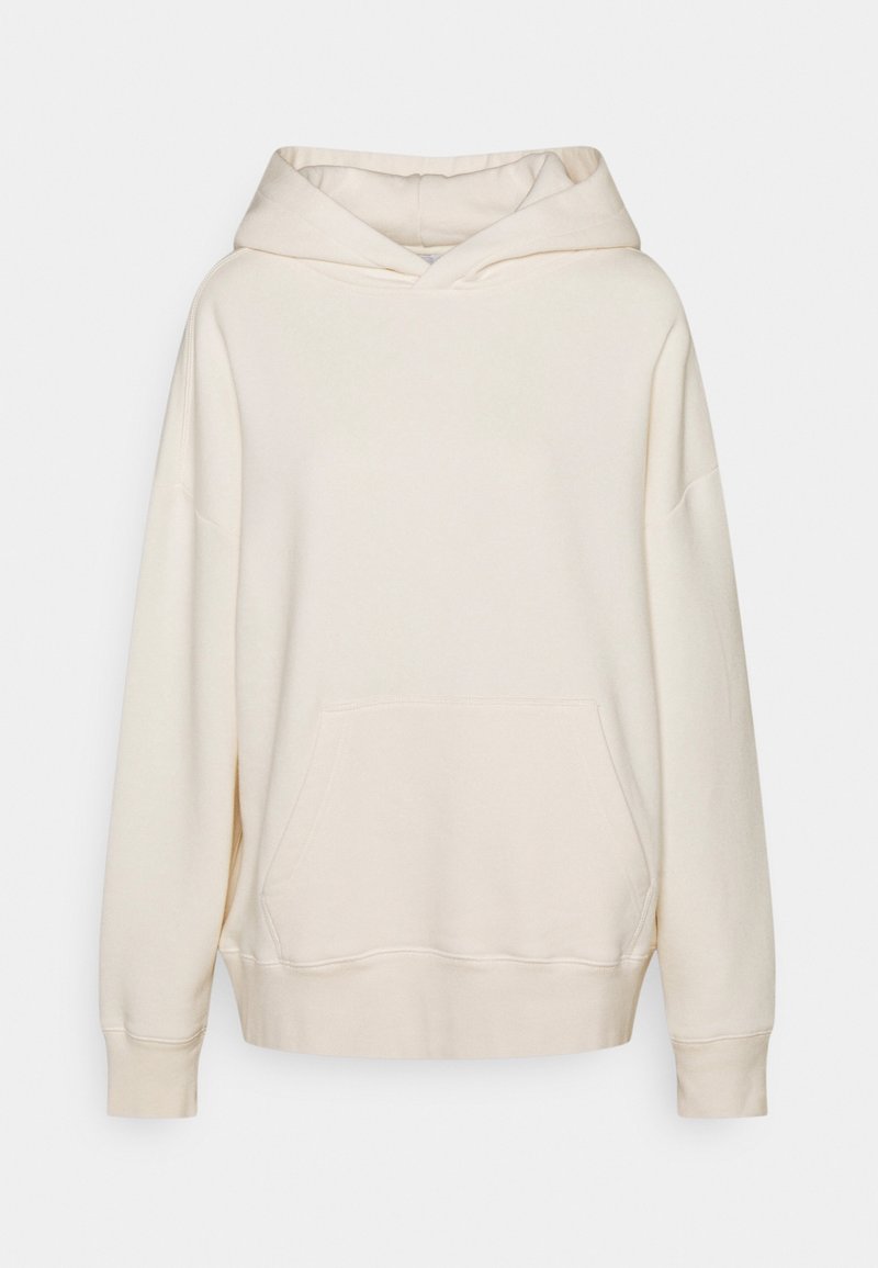 Sweat à capuche couleur crème avec une grande poche avant, des poignets côtelés et une capuche classique à cordon. Tissu doux avec une coupe décontractée.