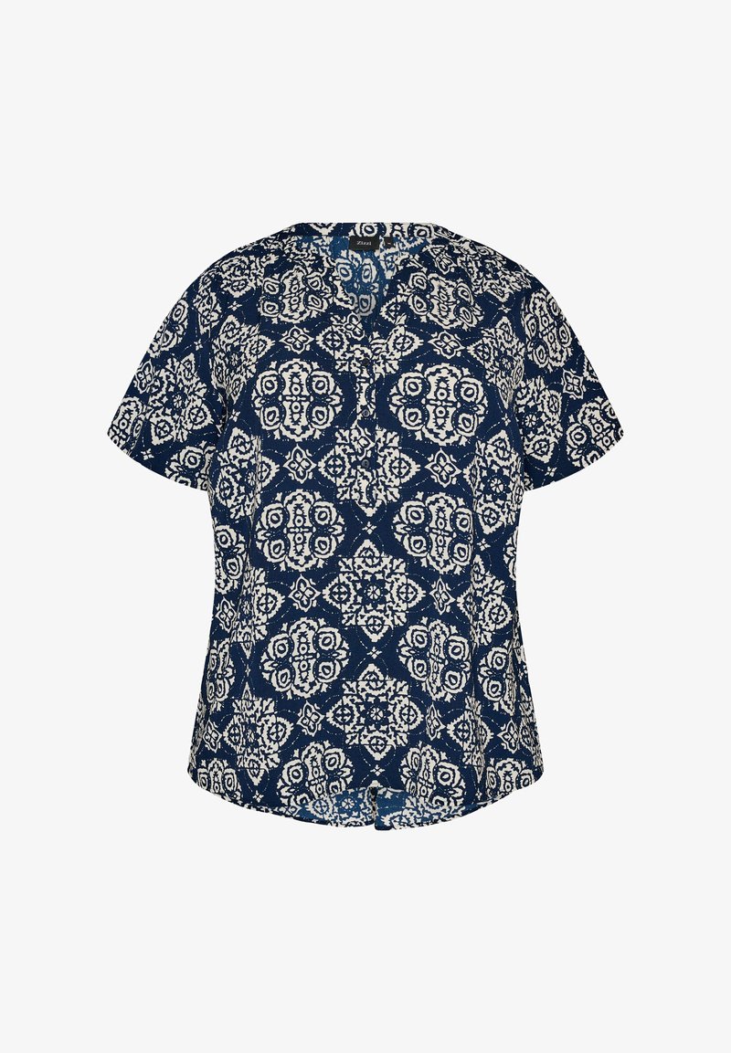 Blouse bleu marine à manches courtes avec des motifs géométriques et floraux blancs complexes, col rond et petite ouverture en forme de goutte d'eau à l'avant.