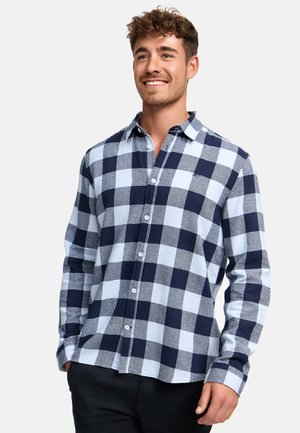 Cotton button-up shirt featuring a light blue and navy check pattern, long sleeves, and a collar. Stylish and casual design with a straight hem.