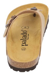 Chancla de color beige claro con tira de cuero marrón, plantilla tipo ante, entresuela de corcho y suela exterior de goma texturizada. Marca "Palado" visible.