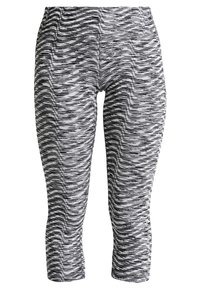 Černobílé capri legíny se zvlněným vzorem, vyrobené z elastického materiálu. Mají vysoký pas a přiléhavý střih.