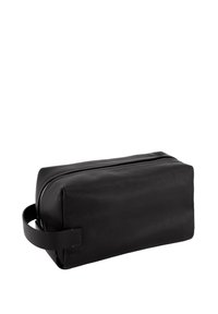 Trousse de toilette rectangulaire en cuir noir avec fermeture éclair et poignée latérale, présentée sur un fond blanc.